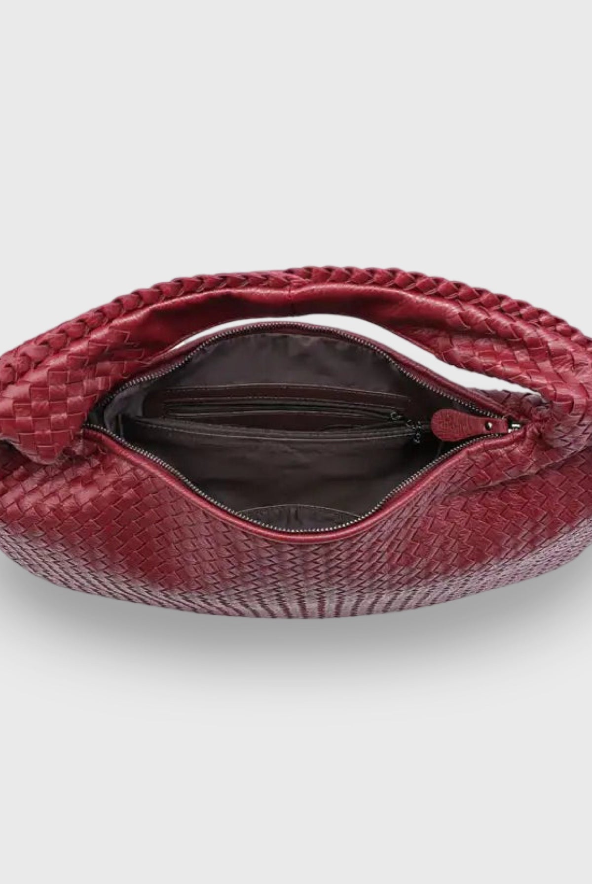 Burgundy woven leather hobo bag with zip open, top-down view