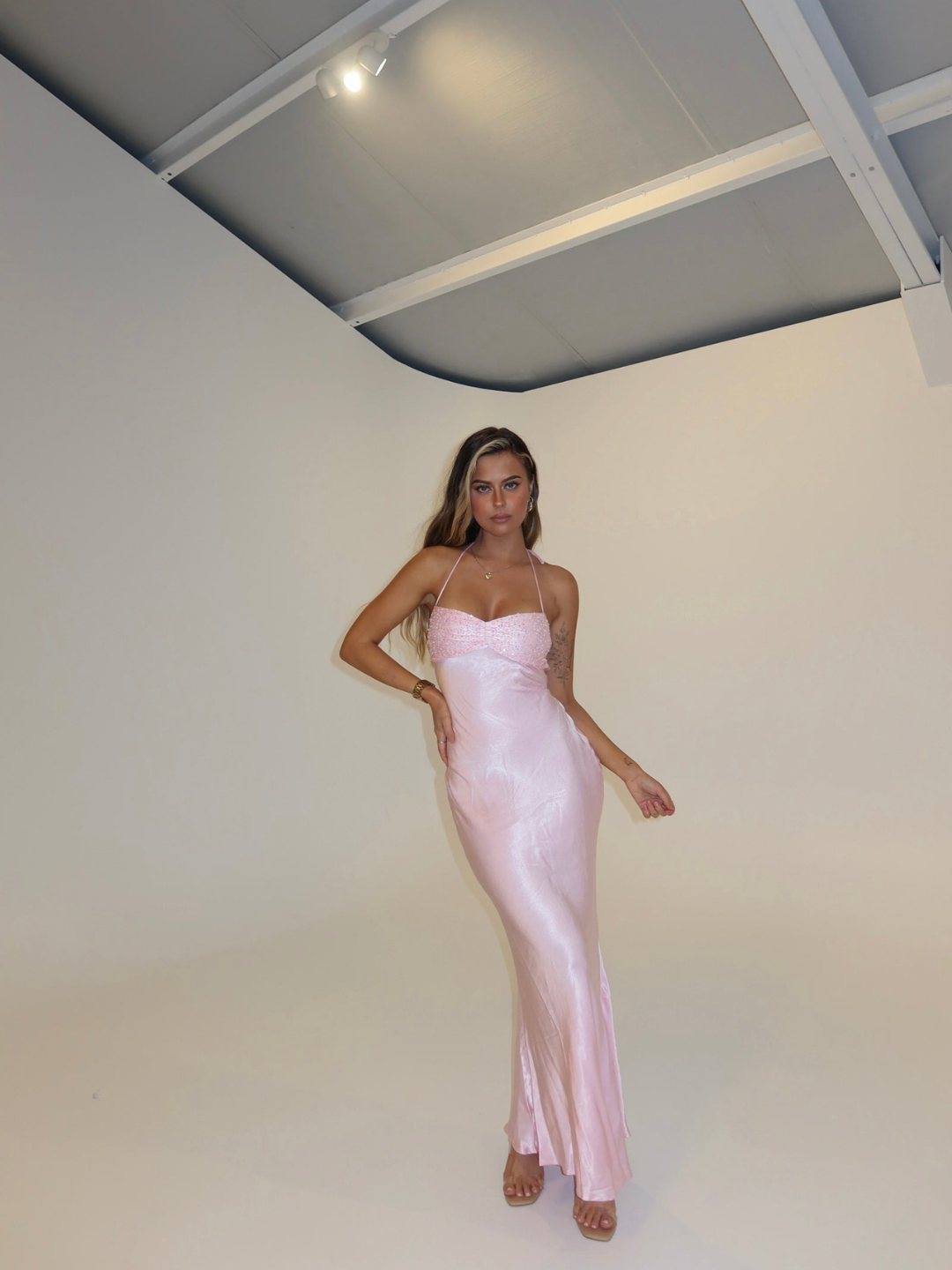 Pink satin slip maxi dress with lace bodice, alternate front view on model