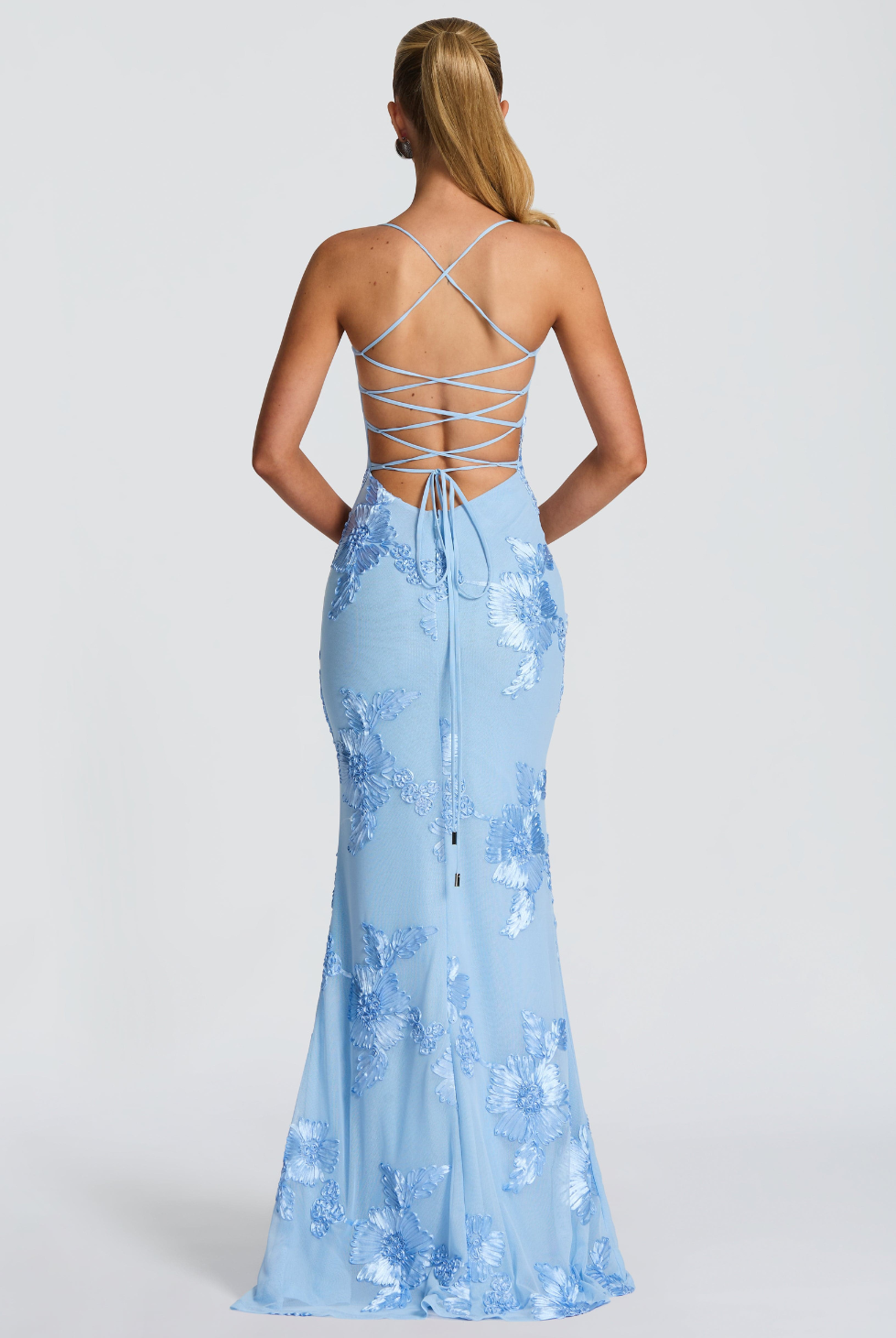 Baby blue fitted maxi dress with lace-up open back, back view on model