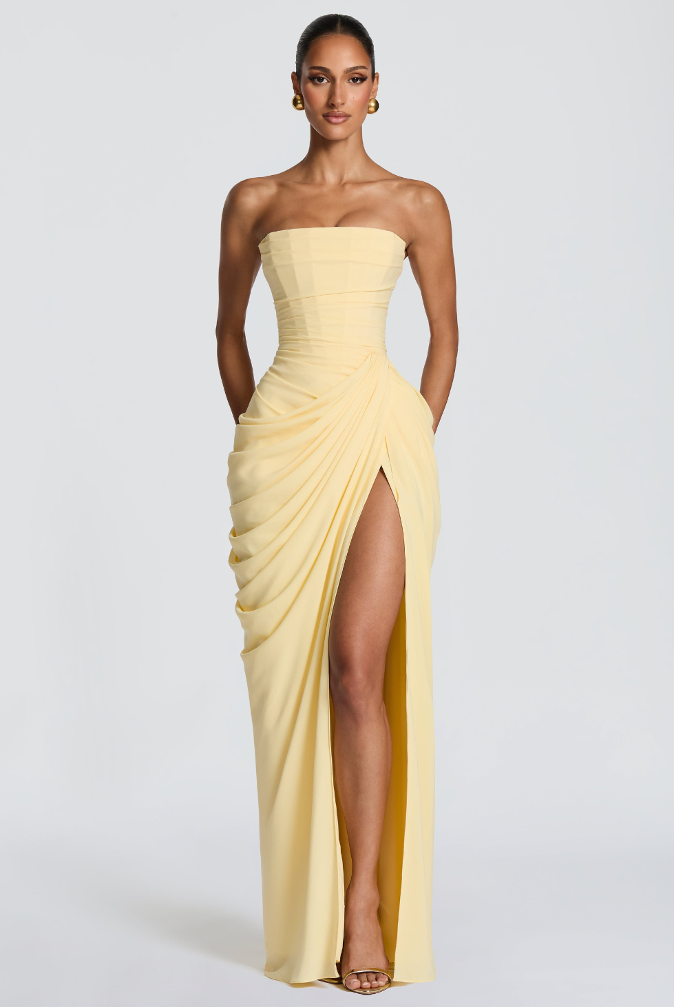 Lemon strapless maxi dress with thigh-high split, front view on model