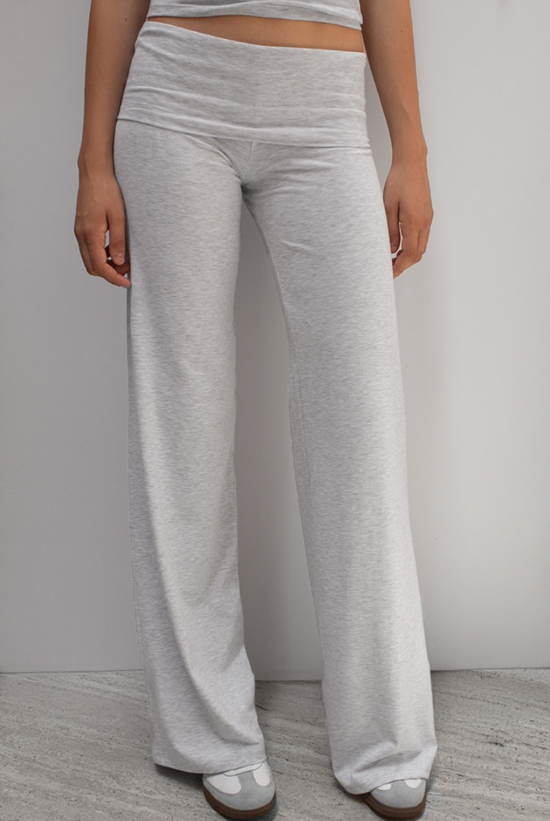 Grey joggers with fold-over waistband, front view on model