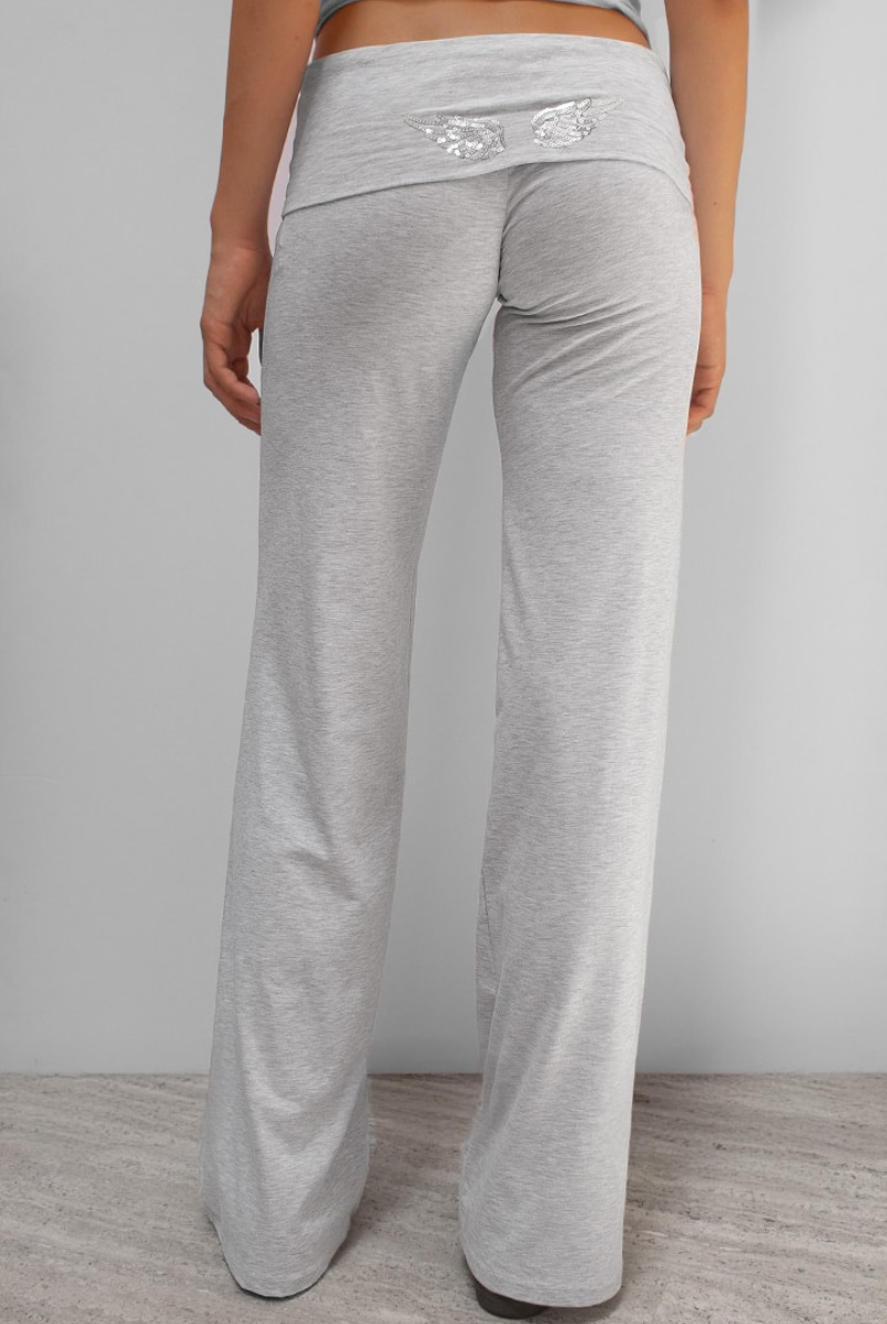 Grey joggers with sequin wing detail on waistband, back view on model