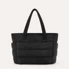 Black quilted puffer tote bag, front view on plain background