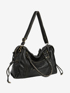 Black vintage-style weave bag with crossbody strap, angled view