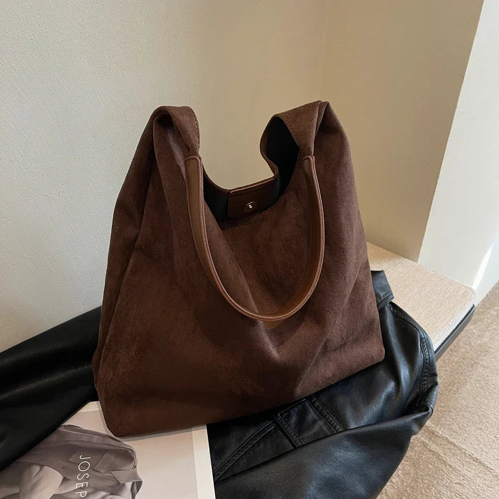 Dark brown suede shoulder tote bag with leather handle