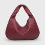 Burgundy woven leather hobo bag, front view on plain background