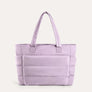 Light purple quilted puffer tote bag, front view on plain background
