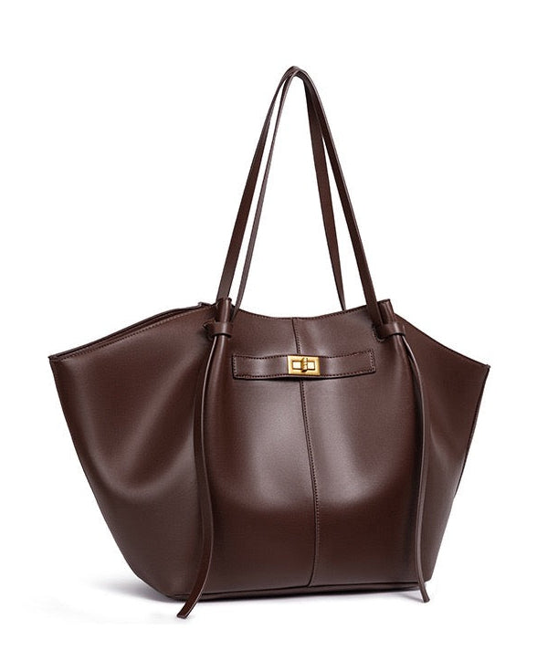 Chocolate brown leather tote bag, angled side view on white background