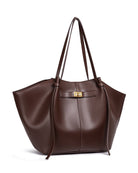Chocolate brown leather tote bag, angled side view on white background