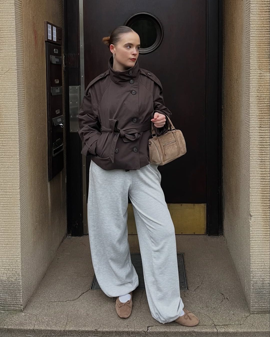 Brown short trench coat with high collar, full length front view