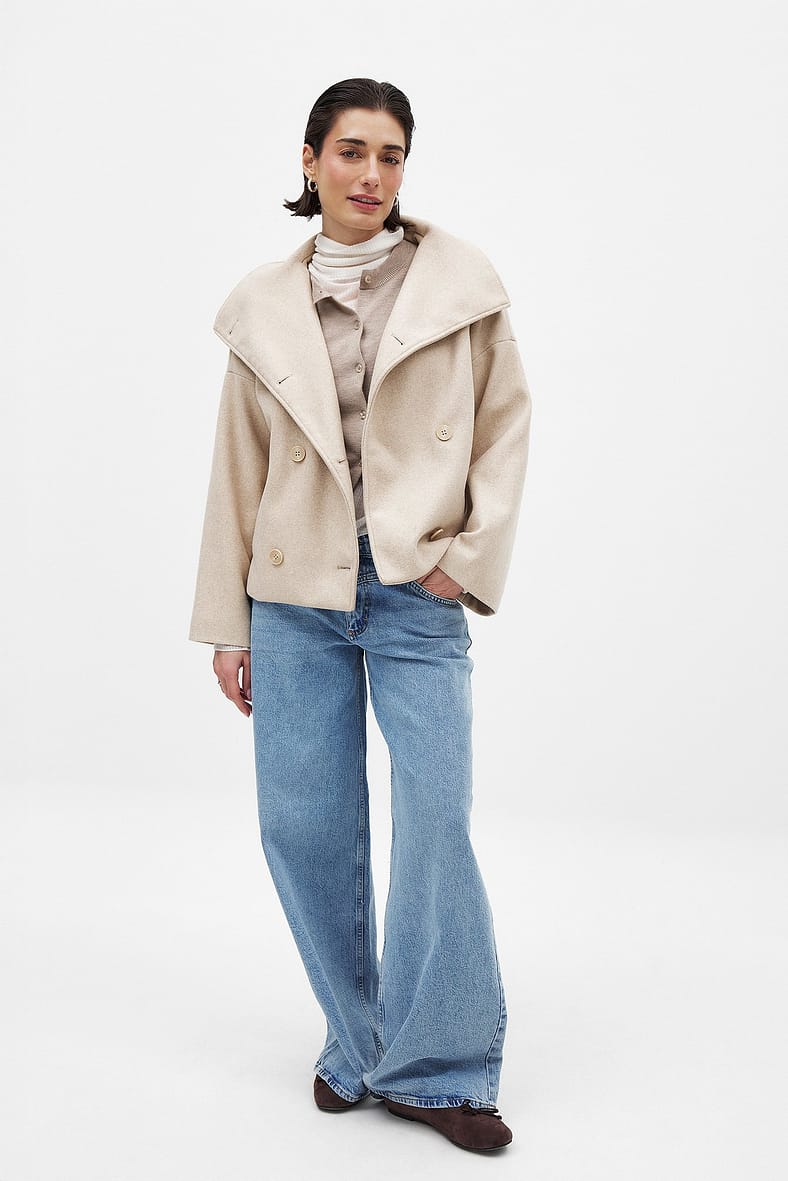 Light beige double-breasted cropped coat, full-length front view