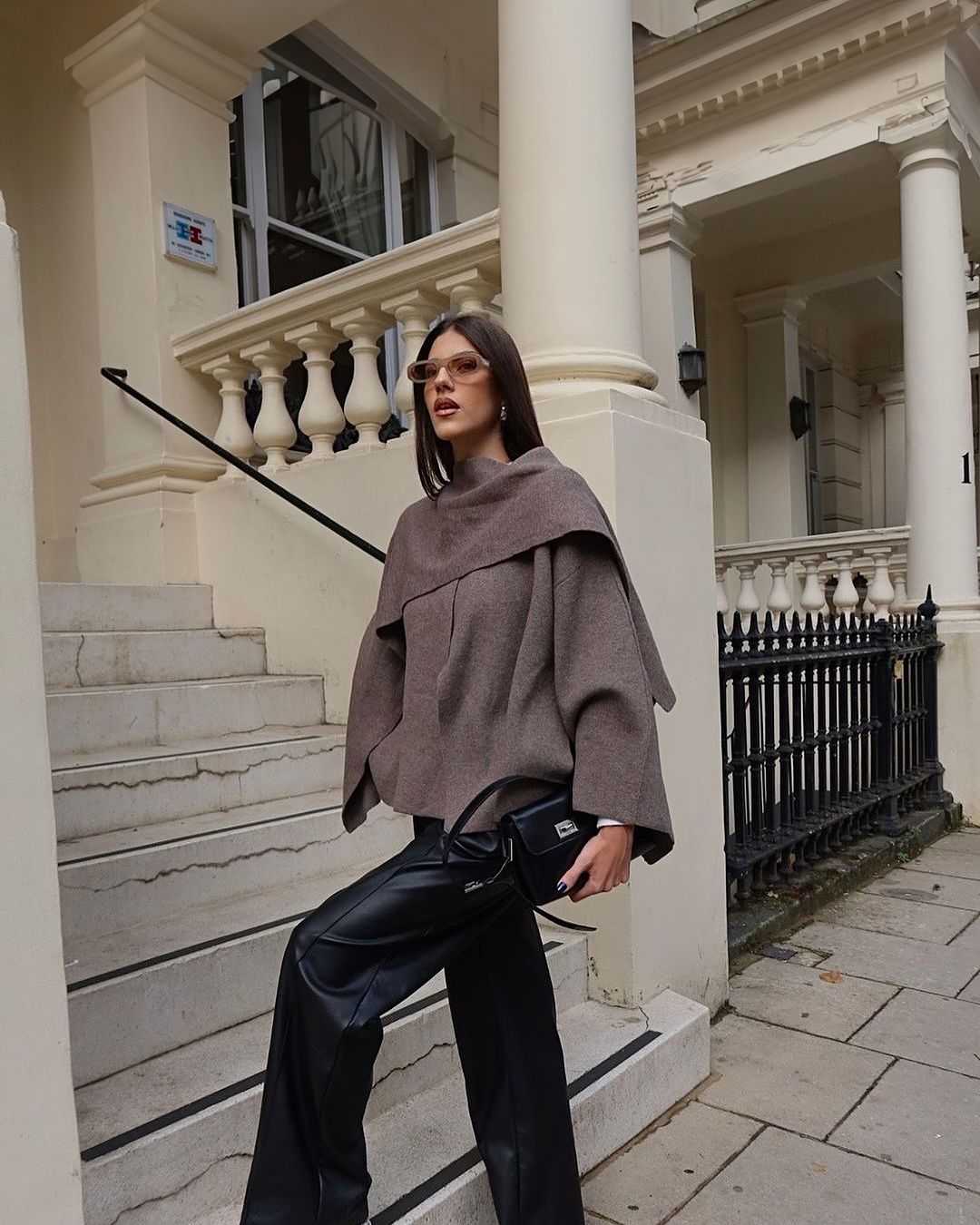 Taupe short cape with draped cowl neck, front view on model