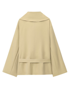 Flat lay of beige belted trench jacket, back view