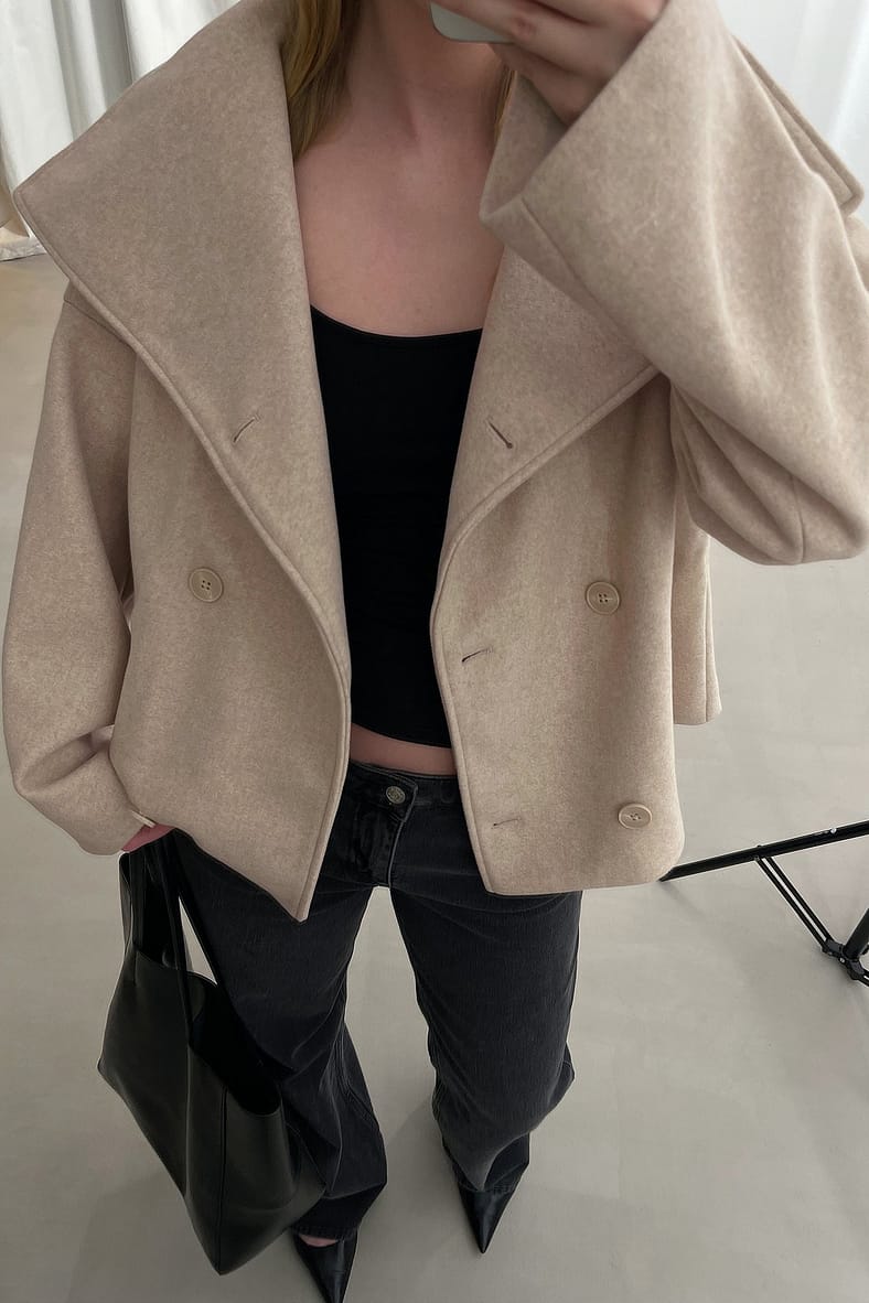 Light beige double-breasted coat, close-up mirror selfie on model