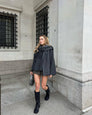 Charcoal short cape with wrapped scarf detail, front view on model