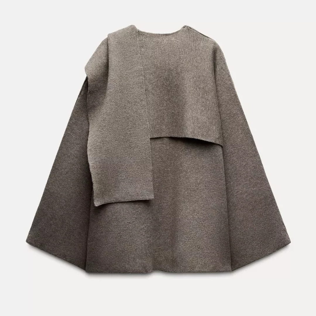 Taupe short cape, back view flat lay product shot