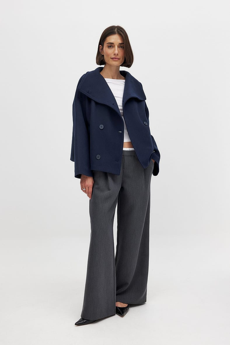 Navy double-breasted cropped coat, full-length front view