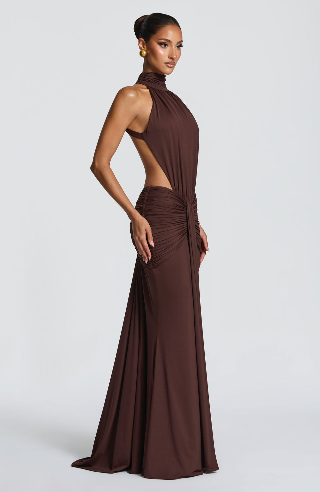 Mocha halter maxi dress with side cutout, profile view on model
