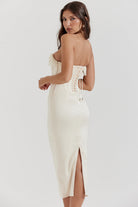 Ivory corset midi dress, back view showing lace-up detail and side slit