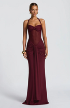 Wine halter neck maxi dress with ruched skirt, front view on model