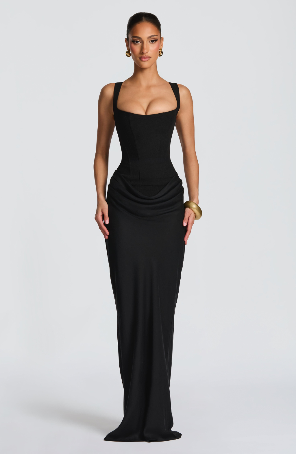 Black corset-style maxi dress on model, front view