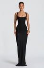 Black corset-style maxi dress on model, front view