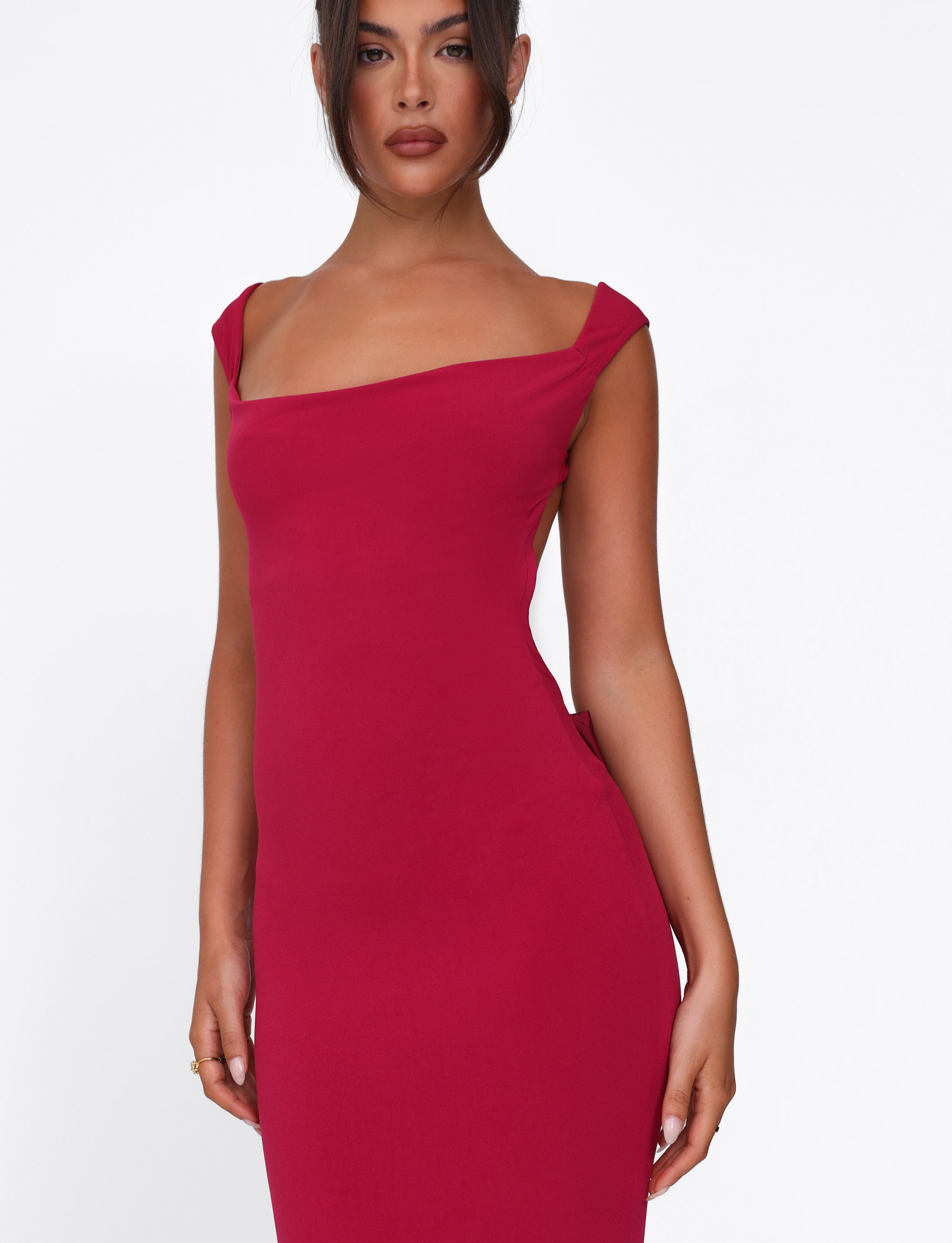 Deep red maxi dress, close-up of the asymmetric neckline