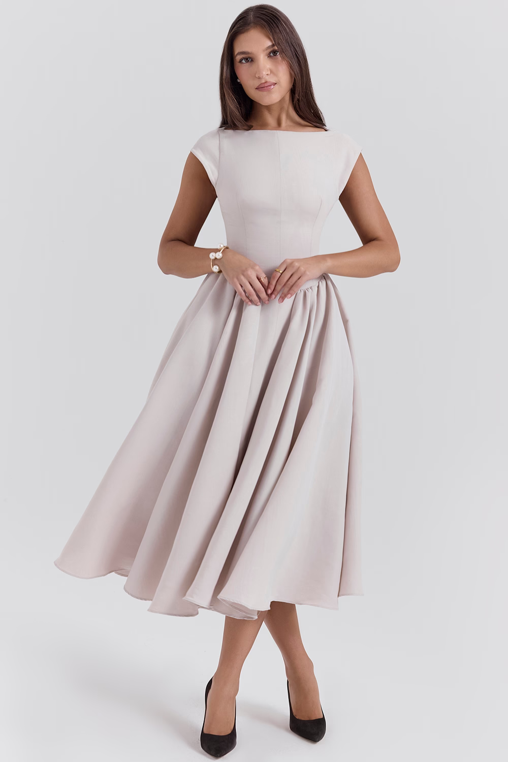 French dove grey full-skirt midi dress, front view with hands clasped