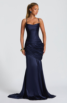 Navy satin gown with ruched skirt, front view with bracelet