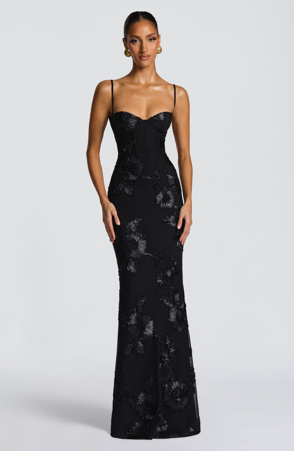 Black fitted maxi dress with floral lace embroidery, front view on model
