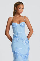 Close-up of baby blue floral lace corset bodice on maxi dress