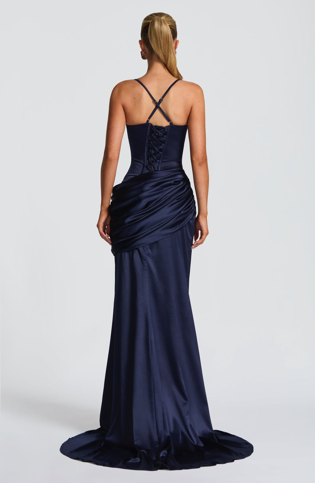 Navy satin gown with corset lace-up back, back view on model