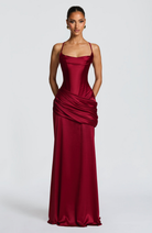 Burgundy satin gown, front view with hands behind back