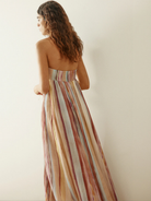 Strapless maxi dress in pink and blue stripes, back view on model
