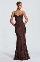 Mocha brown fitted maxi dress with floral lace embroidery, side view on model