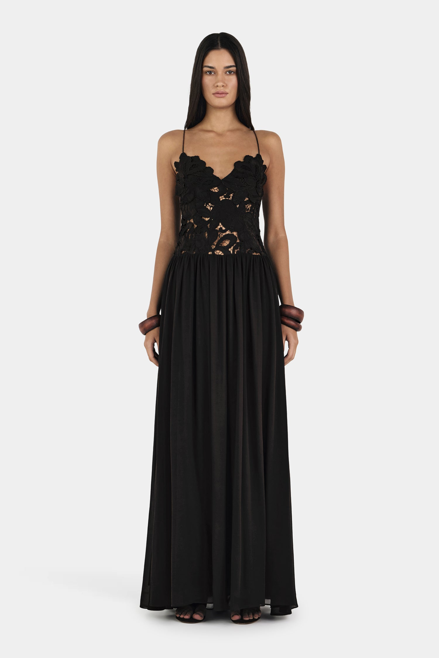 Black lace maxi dress with scalloped bodice, front view on model