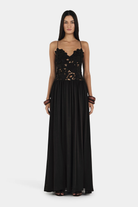 Black lace maxi dress with scalloped bodice, front view on model