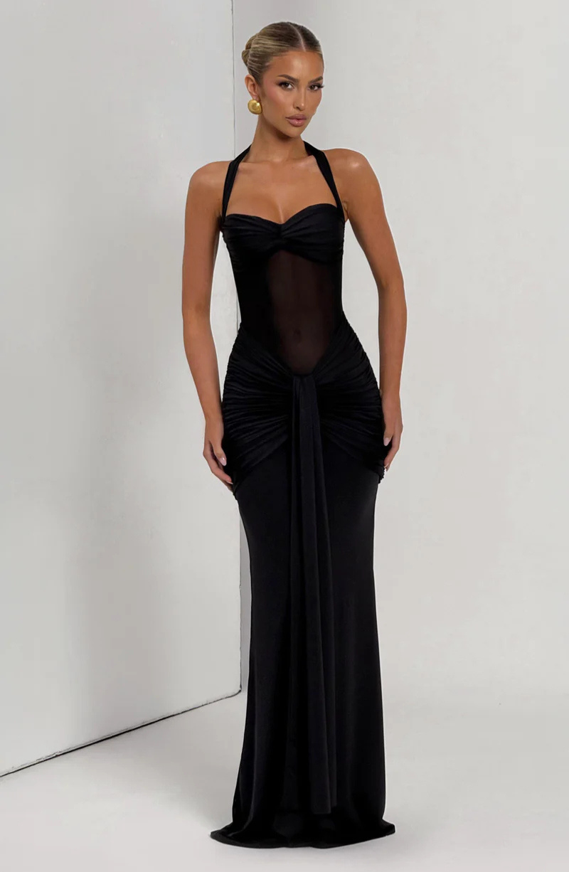 Black halter neck maxi dress, three-quarter front view on model