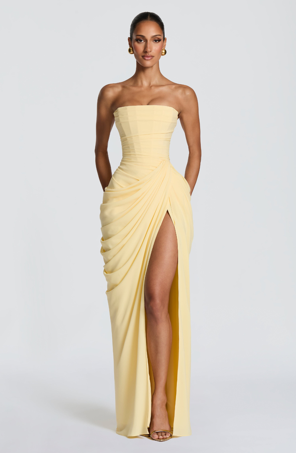 Lemon strapless maxi dress with thigh-high split, front view on model