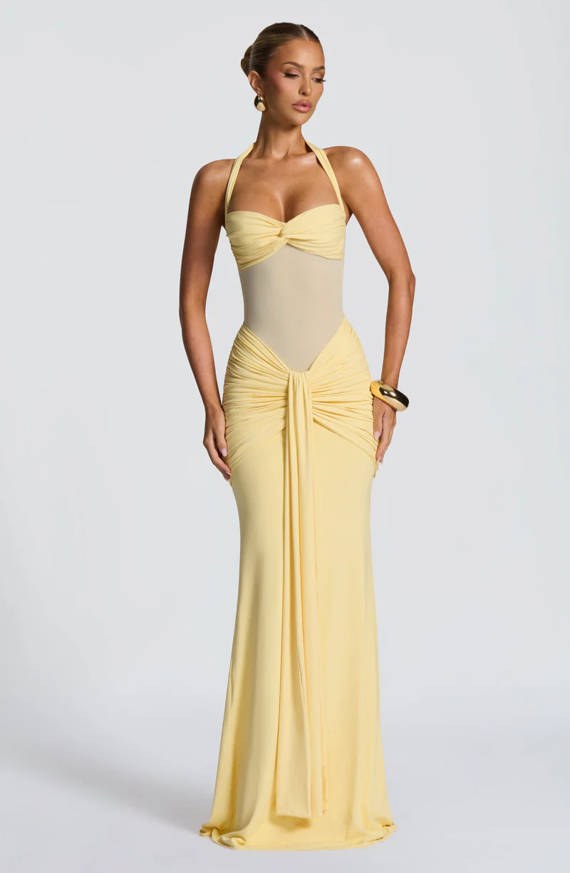 Lemon halter neck maxi dress, front view with hands on hips