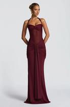 Wine halter neck maxi dress, front view with hands behind back