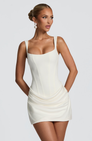 Ivory corset mini dress with ruched skirt, front view on model