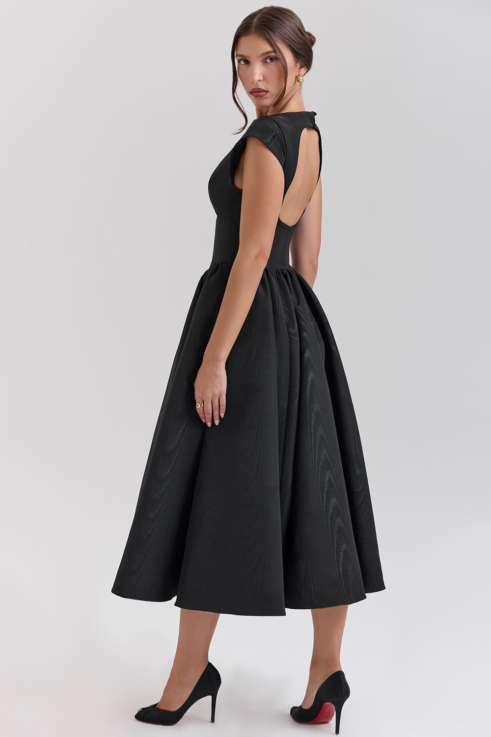 Black full-skirt midi dress, back and side view on model