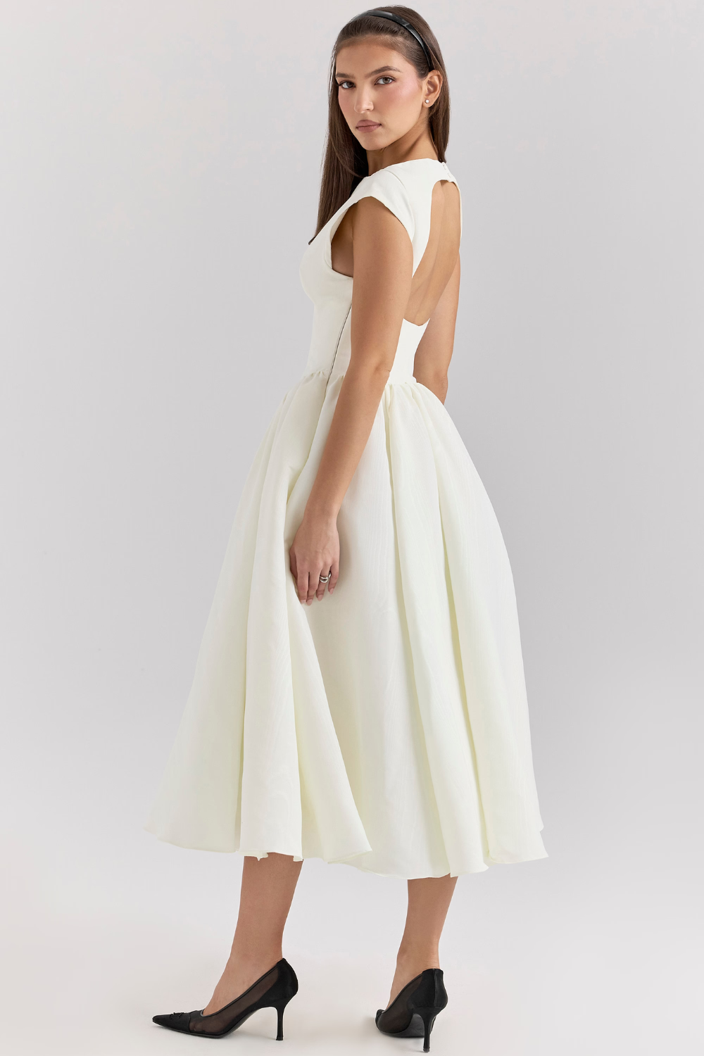 Ivory full-skirt midi dress, side view showing open back
