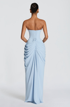Ice blue strapless maxi dress with corset lace-up back, back view on model