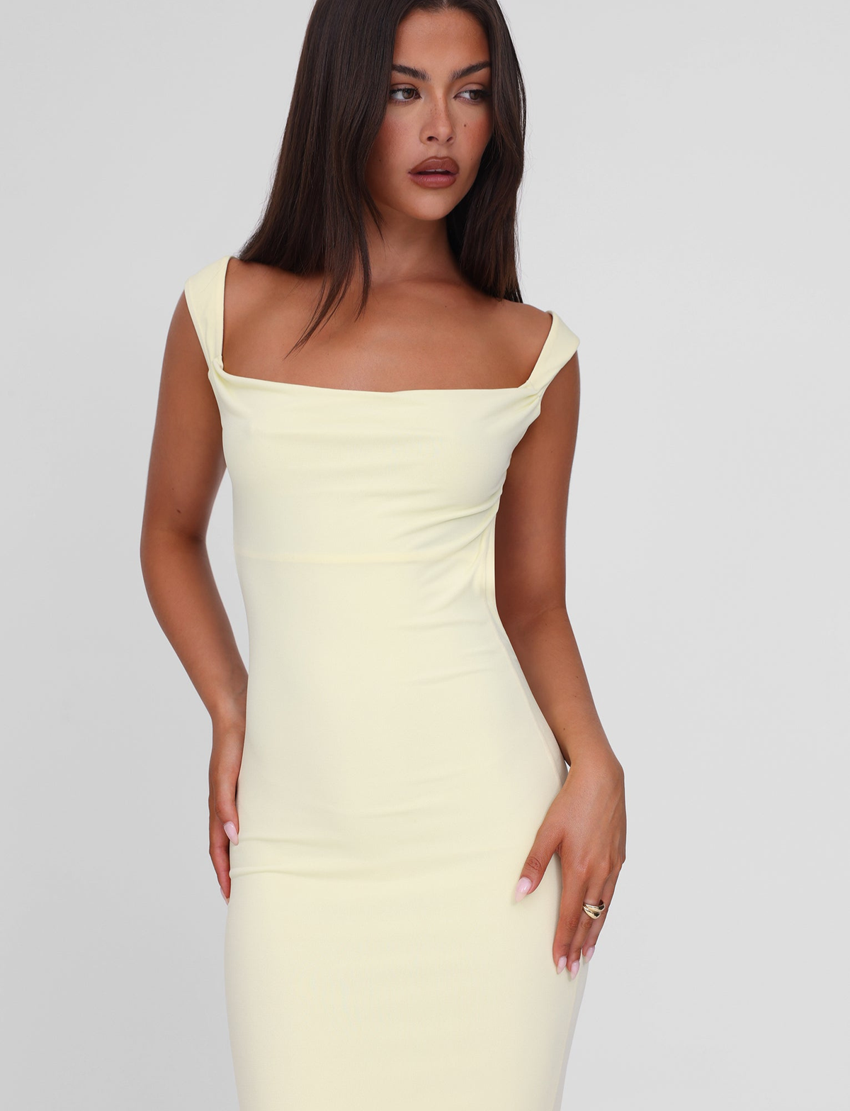 Lemon yellow maxi dress, close-up of the asymmetric neckline