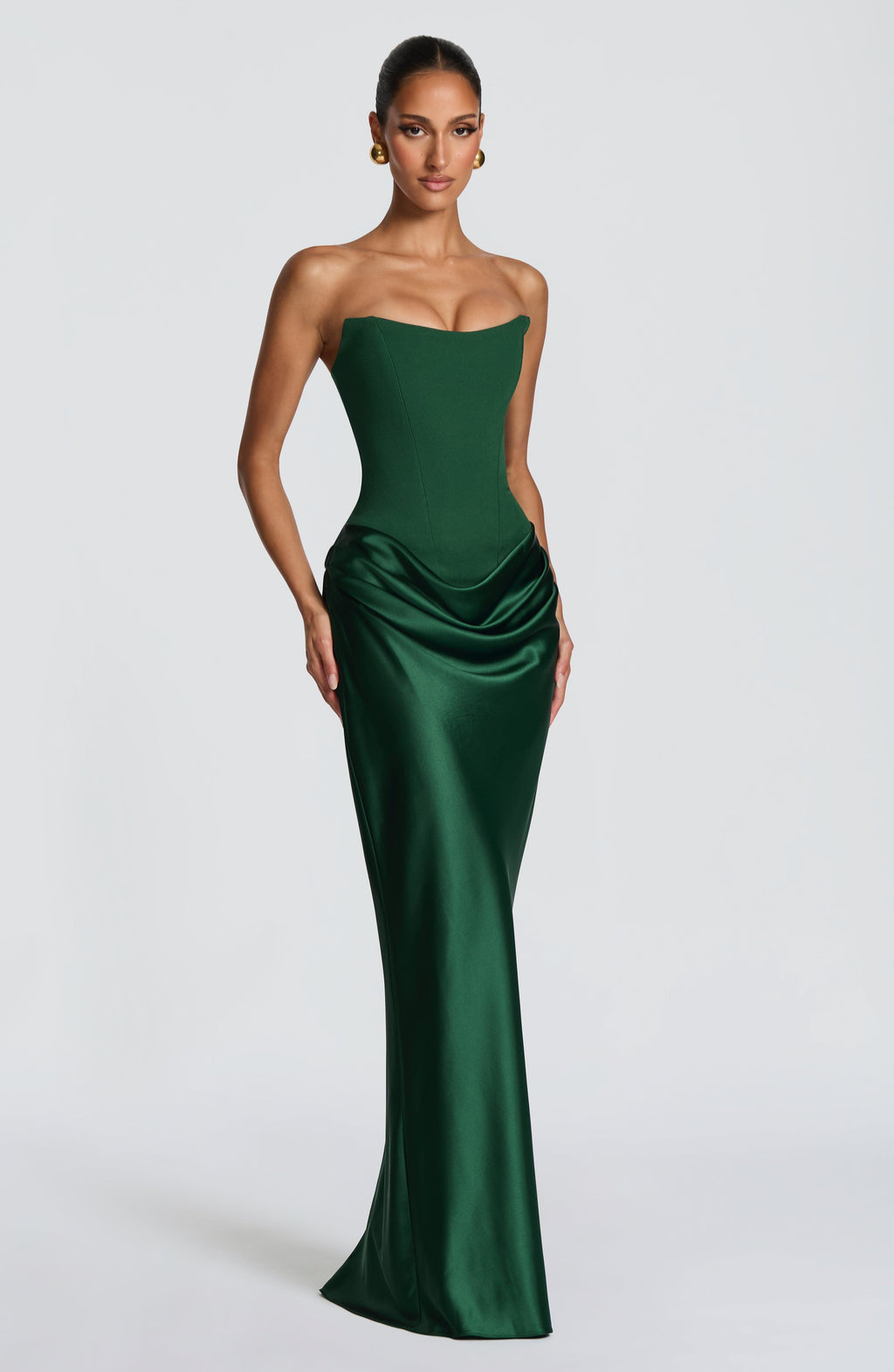 Emerald green strapless satin maxi dress, angled front view on model