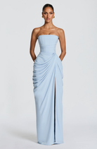 Ice blue strapless maxi dress with draped skirt, close front view on model