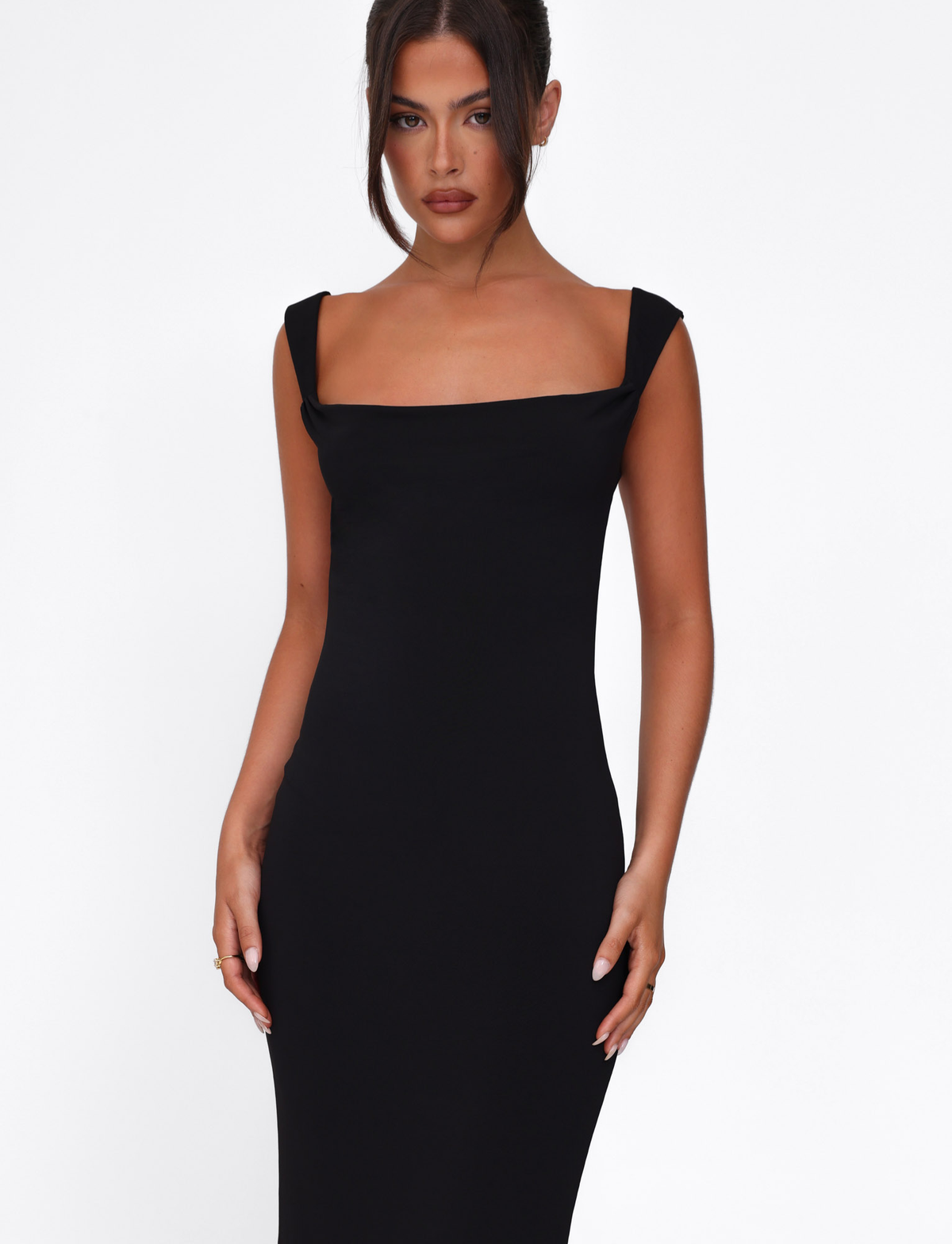 Black maxi dress, close-up of the asymmetric neckline