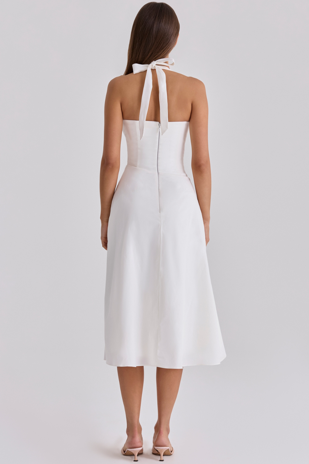 Ivory halter-neck midi dress with tie fastening, back view on model